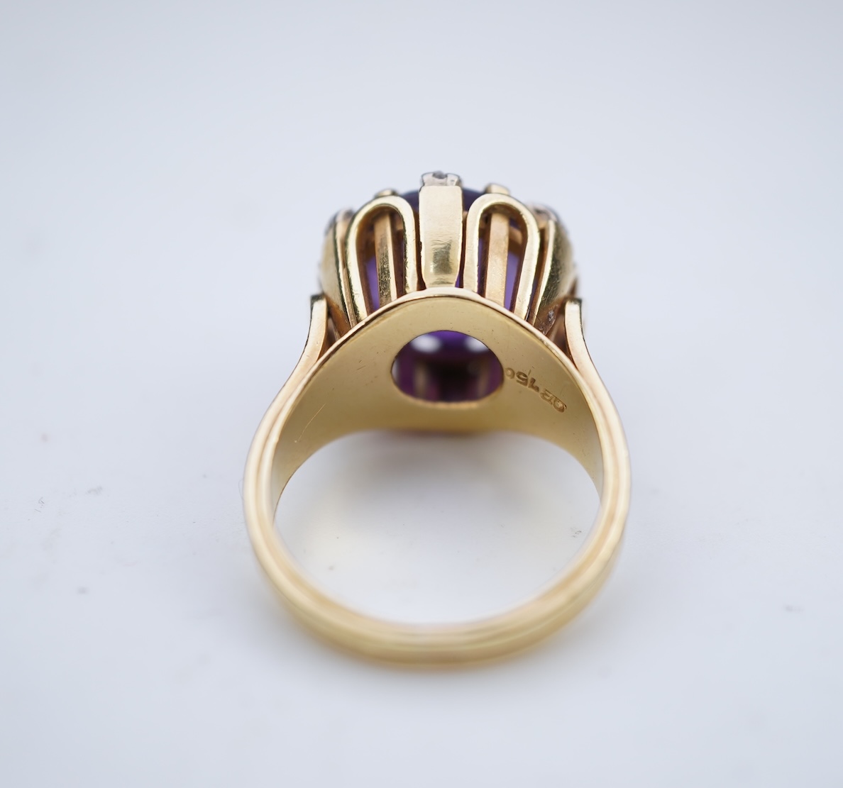 A stylish amethyst and diamond ring